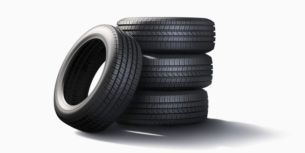 How to Choose New Tires for Your Car pile of tires on white background royalty free image 672151801 1561751929